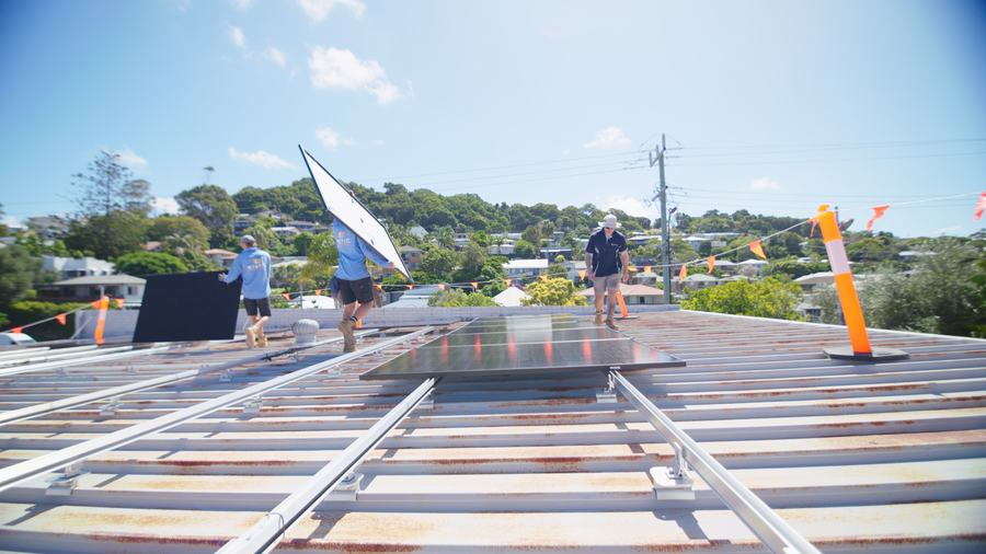 A commercial rooftop solar install by the Nickel Energy team